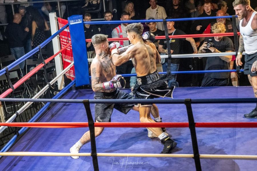 Ellis Harkins landing a punch during a fight